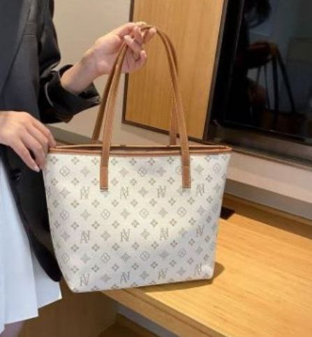 תיק יד מעצבים